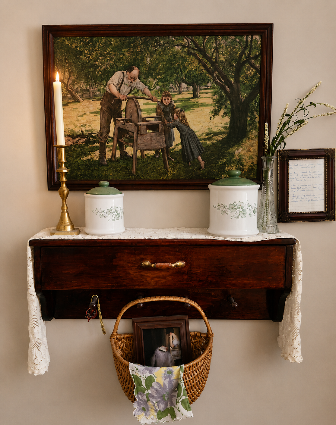 Antique wall shelf with a vintage painting of a grandfather and children, white ceramic canisters, brass candlestick, and a wicker basket below